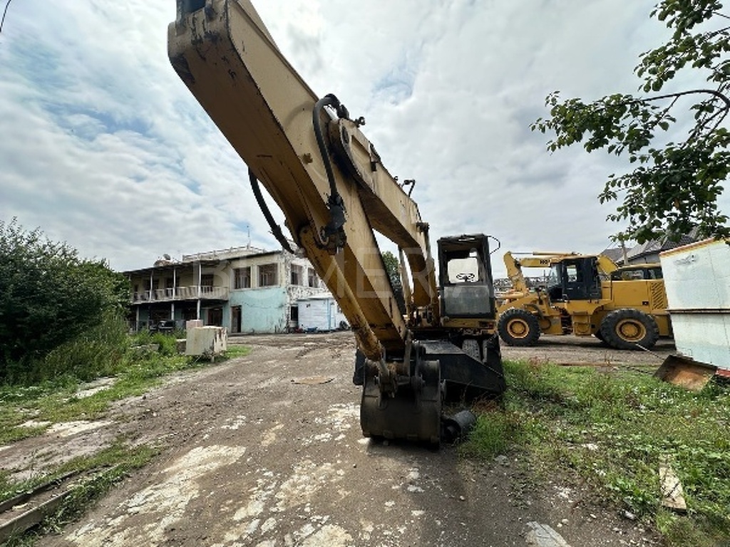 Cat, Yükləyicilər, 1996, 1 km