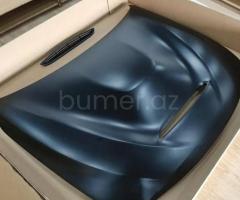 Ban-Kuza hissələr BMW