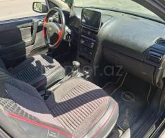Opel Astra 1999 Benzin 75 Hetçbek 312500 km Avtomat