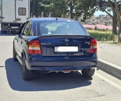 Opel Astra 1999 Benzin 75 Hetçbek 312500 km Avtomat