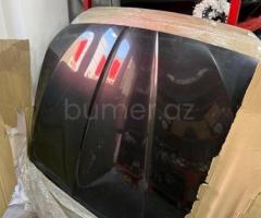 Ban-Kuza hissələr BMW