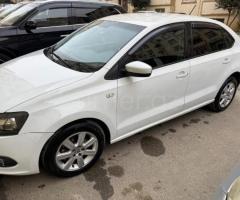 Volkswagen Polo 2015 Benzin 110 Hetçbek 221300 km Avtomat