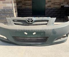 Ban-Kuza hissələr Toyota