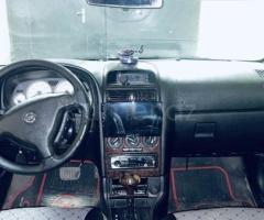 Opel Astra 1999 Benzin 136 Hetçbek 350000 km Avtomat