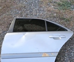 Ban-Kuza hissələr, Mercedes Benz sol qapı